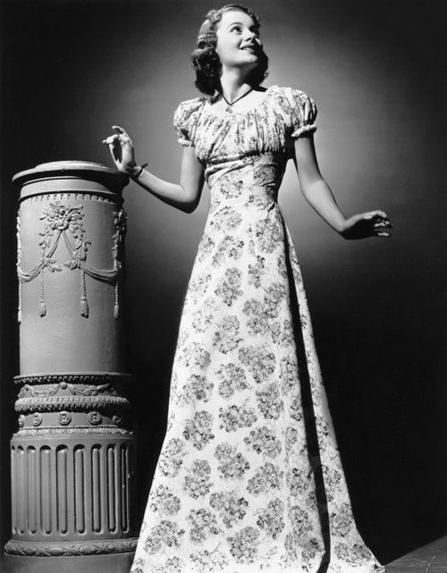 Olivia De Havilland Modeling A 'Youthful Summer Formal' 1939 Photo Print - Item # VAREVCPBDOLDEEC178H