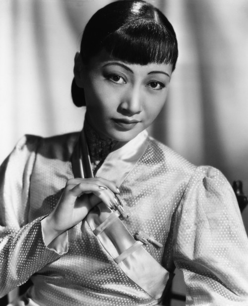 Anna May Wong In An Orange Nanking Brocade Robe With Sandalwood Fastenings 1937 Photo Print - Item # VAREVCPBDANMAEC045H