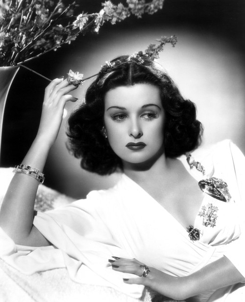 She Knew All The Answers Joan Bennett Reclining And Touching A Flower 1941. Photo Print - Item # VAREVCPBDJOBEEC046H