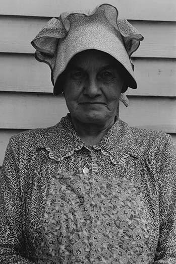 Member of the congregation of Wheeley's church who is called "Queen." She is wearing the old fashioned type of sunbonnet. Her dress and apron were ... Member of the congregation of Wheeley's church who is called "Queen." She is wearing the old fashioned type of sunbonnet. Her dress and apron were ...