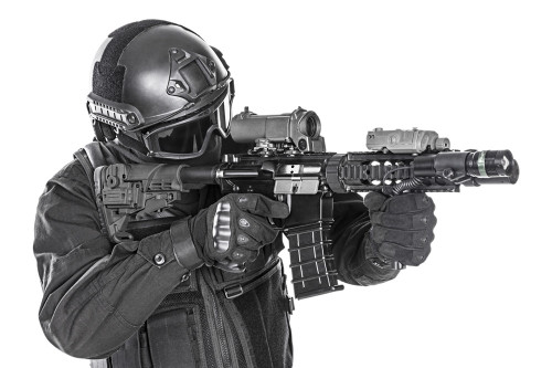 Studio shot of SWAT police special forces with automatic