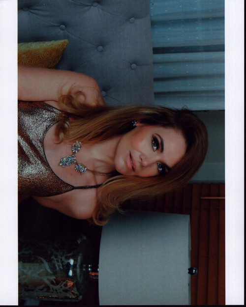 Amy Sutherland In Gold Top Photo Print - Item # MVM55218 - Posterazzi