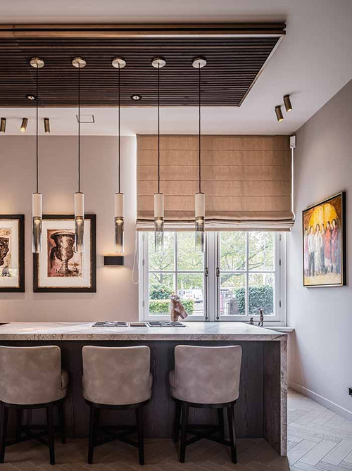 Infinito hanglamp 1-lichts brons ontworpen door Marcel Wolterinck