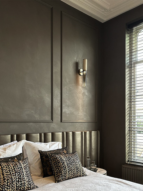 Infinito wandlamp brons ontworpen door Marcel Wolterinck