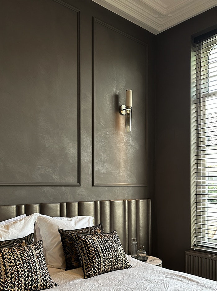 Infinito wandlamp brons ontworpen door Marcel Wolterinck