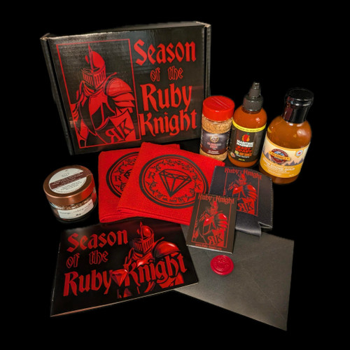A BBQ gift set for BBQ enthusiasts. BBQ sauce, rub, hot sauce,   smoked salt. Includes various quality merchandise that is meant to be used for the long term.