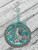 Ornament Glitter Hound and Roses Teal with Swirl Hanger