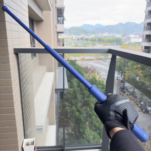 High-impact polymer tactical practice baton with textured grip for martial arts training."