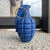 Safe tactical training grenade dummy with removable pin for martial arts and law enforcement exercises.