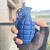 Safe tactical training grenade dummy with removable pin for martial arts and law enforcement exercises.