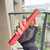 High-impact polymer tactical practice baton with textured grip for martial arts training."