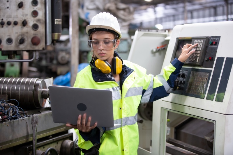 Worker with helmet and tools