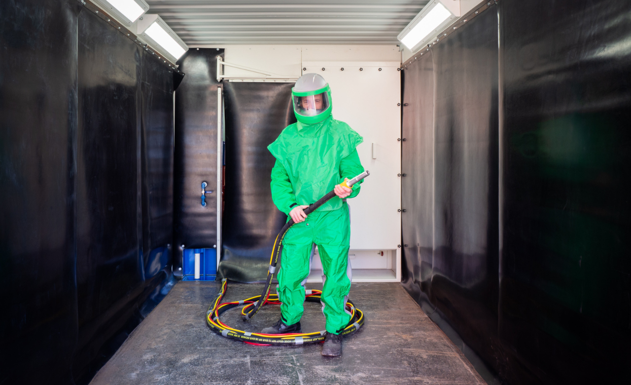 What is blast cleaning?