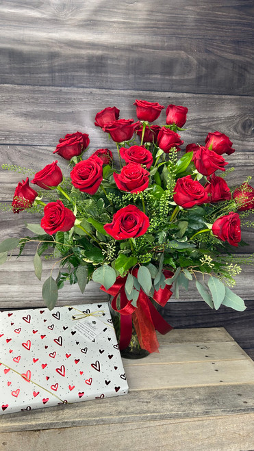 Say "I Love You" with a classic arrangement of two dozen long-stem red roses and a box of Abdallah's Select Assortment.