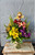 Summer’s Gone Scaries floral arrangement featuring seasonal autumn flowers in deep, moody colors with textured greenery and unique fall accents, handcrafted by Main Floral in Anoka, MN — perfect centerpiece or gift for fall, Halloween, or harvest celebrations