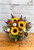 Gourd Adored autumn floral arrangement featuring gourds, fall flowers in warm orange, golden, cream and green tones, natural rustic foliage, handcrafted by Main Floral in Anoka MN — perfect for Thanksgiving centerpiece or autumn home décor.