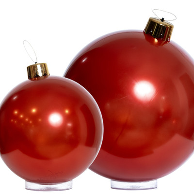 vintage red medium and larg holiball inflatable ornament on clear base tray