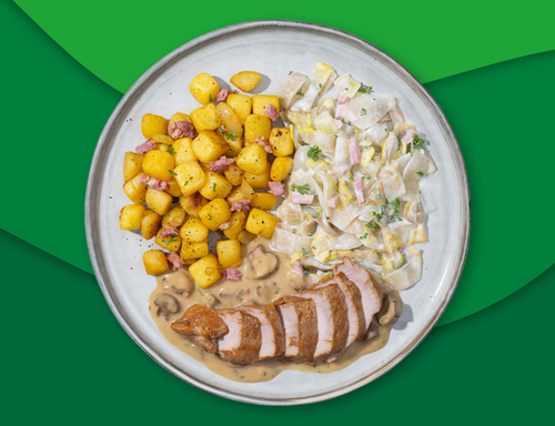 Varkenshaasoester champignonsaus, kriel met spek, ui en witlof à la crème met ham