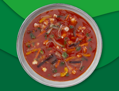 Chinese tomatenmaaltijdsoep met stukjes kip