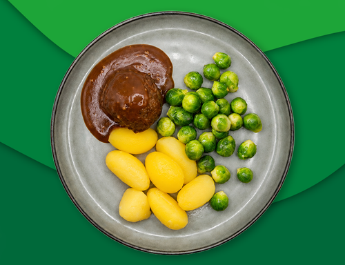 Rundergehaktbal met mosterdjus, aardappelen en spruiten