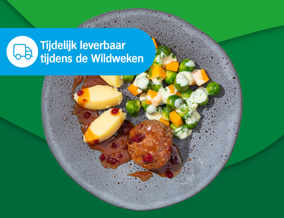 Wildburger met cranberryjus, puree met knolselderij en spruitenpompoenmix