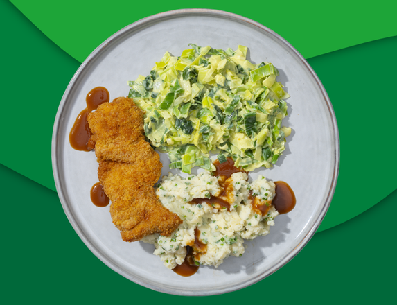 Kipdijschnitzel met jus, puree bieslook en prei à la crème zoutarm
