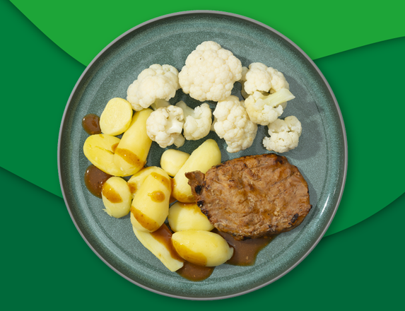 Varkensfiletlap met mosterdjus, aardappelen en bloemkool
