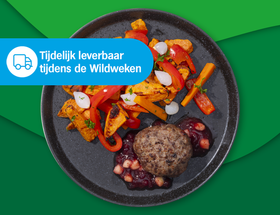 Wildburger met preiselberencompote, zoete aardappel en gemengde groenten