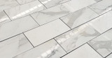 A Timeless Masterpiece: Italian Calacatta Marble – Now In Stock at Portland Direct Tile & Marble!