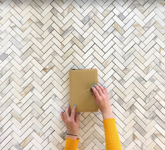 Calacatta Gold Honed 1"x3" Herringbone Mosaic Tiles on 12"x12" Mesh