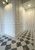 Italian Carrara Tumbled & Nero Marquina Tumbled 12x12 Checkerboard Marble Tiles
