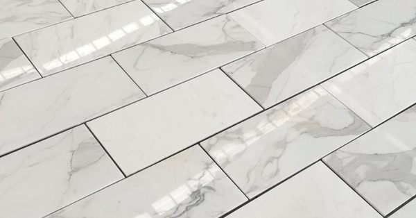 A Timeless Masterpiece: Italian Calacatta Marble – Now In Stock at Portland Direct Tile & Marble!