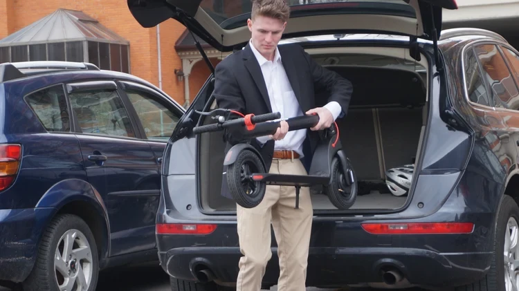 A folded SmartKick scooter for easy carrying