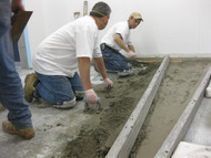 Creating a Pitch to a Concrete Floor Drain in a Fish Processing Facility