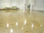 Improved concrete floors with a glossy topcoat