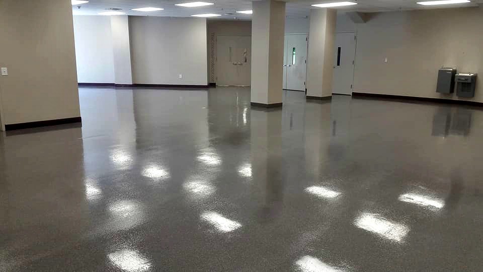 Commercial space finished with a glossy concrete floor sealer.