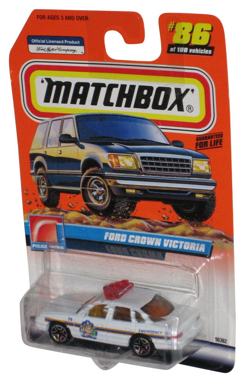 Matchbox 2006 Ford Crown Victoria Taxi - Yellow Diecast Car