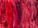 original abstract painting of mostly horizontal uneven lines of many shades of red, and with pinks and purples