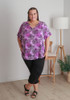 Plus Size Textured Animal Print Top In Purple