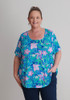 Plus Size Stretch Round Neck Top In Pops Of Pink