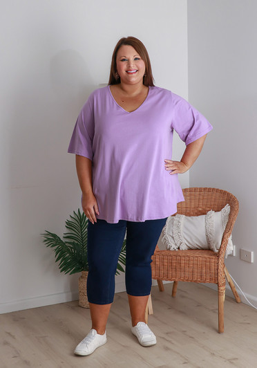 Plus Size V Neck Curved Hem Tee In Lilac