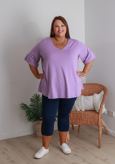 Plus Size V Neck Curved Hem Tee In Lilac