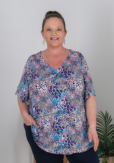 Plus Size Pinched V Neck Top In Animal Print