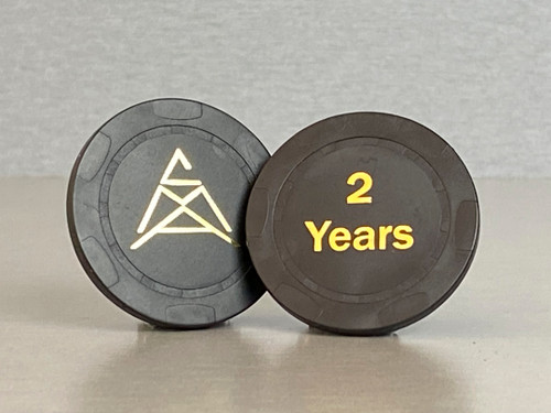 Two year, black anniversary chip with the CMA logo on one side and "2 Years" embossed on the other.
