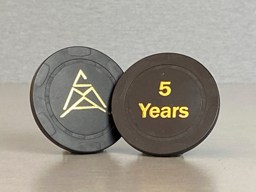 Five year, black anniversary chip with the CMA logo on one side and "5 Years" embossed on the other.