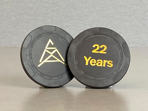 Twenty-two year, black anniversary chip with the CMA logo on one side and "22 Years" embossed on the other.