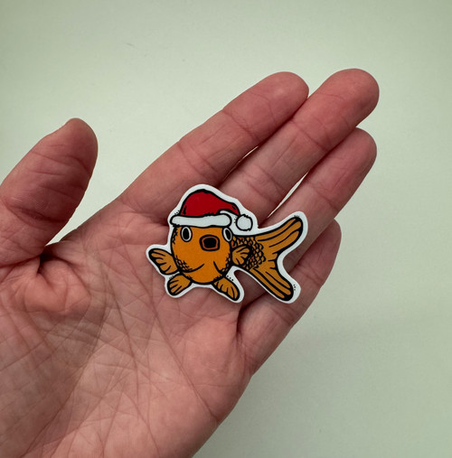 Oscar at Christmas - Laminated Sticker
