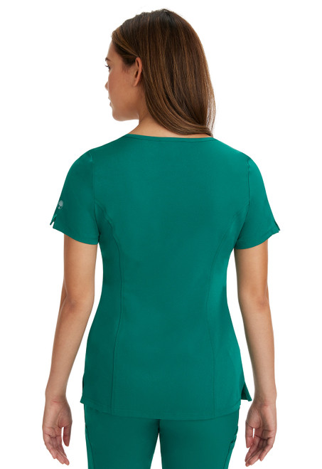 The HH Works Madison Top, with a mock-wrap design, is ideal for medical uniforms. Made of 91% polyester/9% spandex, it features a rounded V-neck, short sleeves, patch pockets, and a flattering 27" length, perfect for nurse scrubs.