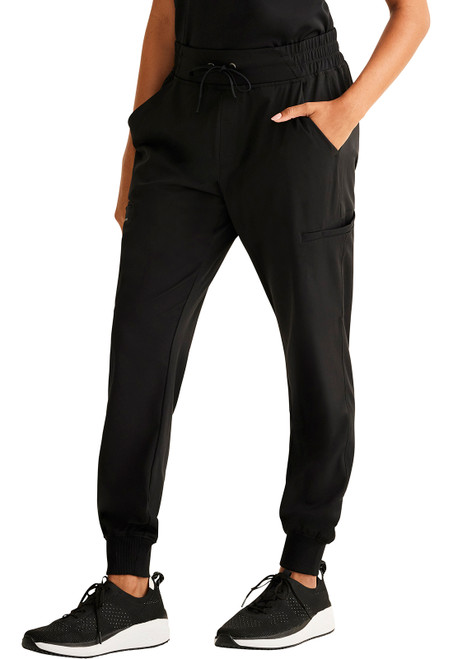 Left view of HH Works Rhea Jogger Pant HH050: 91% polyester, 9% spandex medical scrubs. Features adjustable waistband, multiple pockets, and 2x2 rib knit cuffs for comfort during long shifts.