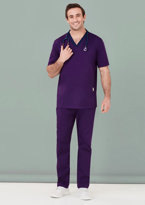 Cotton-rich scrub top blends athleisure style with durability, ideal for long shifts. Stretchy side panels, deep pockets, and bar-tacked stress points ensure comfort and mobility, perfect for medical uniforms in warm climates.